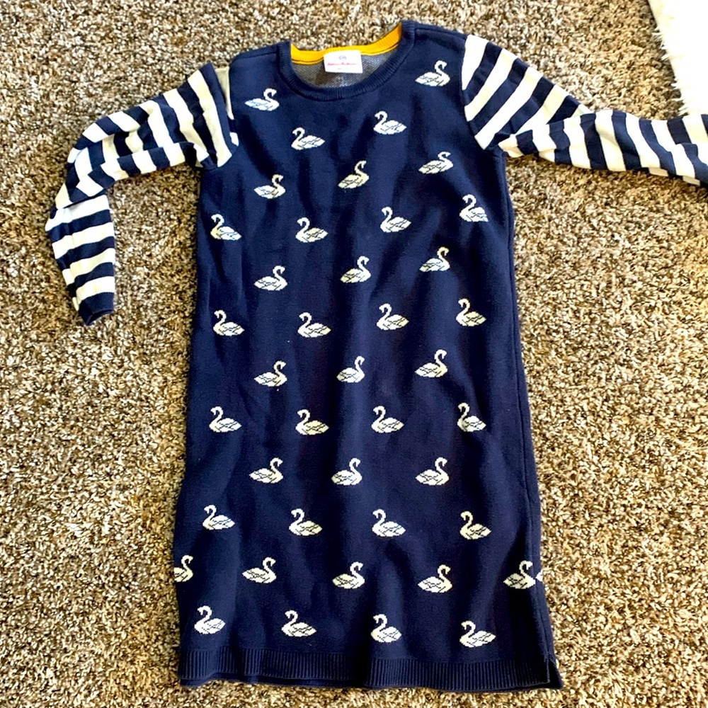 Hanna Anderson sweater dress. Dark blue with white swans and striped sleeves.